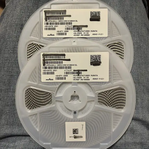 Labeled reels of electronic components for traceability review